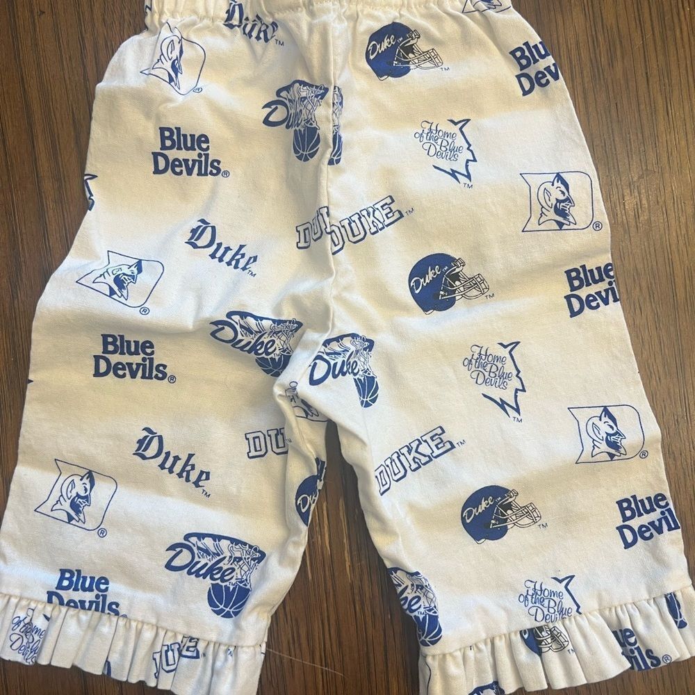 Duke Bluedevils ruffle bottom White and Blue Handmade Baby pants. 3 months.